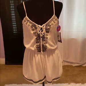 White romper w blue embroidery. Size M NWTS